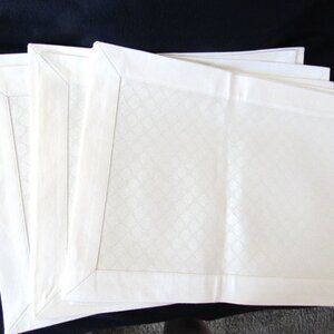 8 Placemats. New.  No tags.